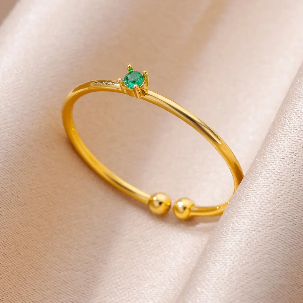 Goudkleurige verstelbare ring met groen zirkonia hart – stijlvolle sieraden