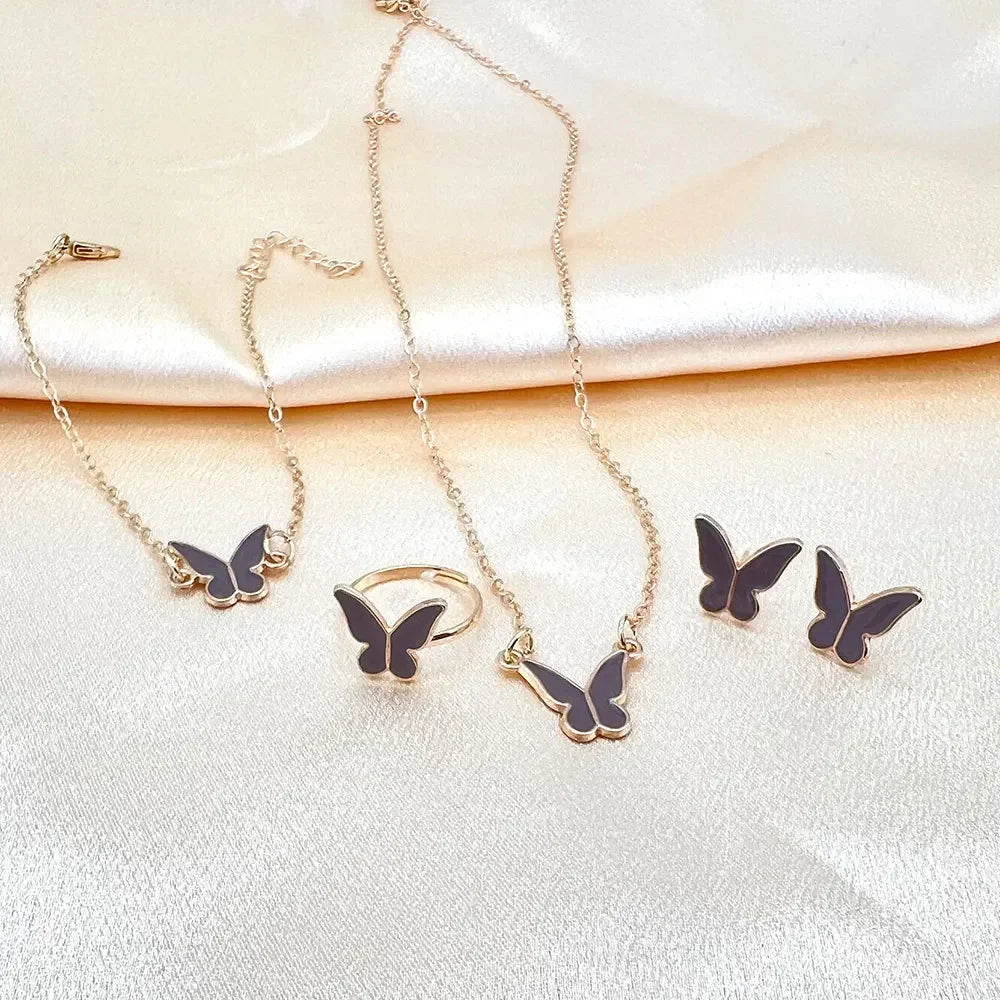 4-delige sieradenset – vlinder hanger en imitatie parel sieraden