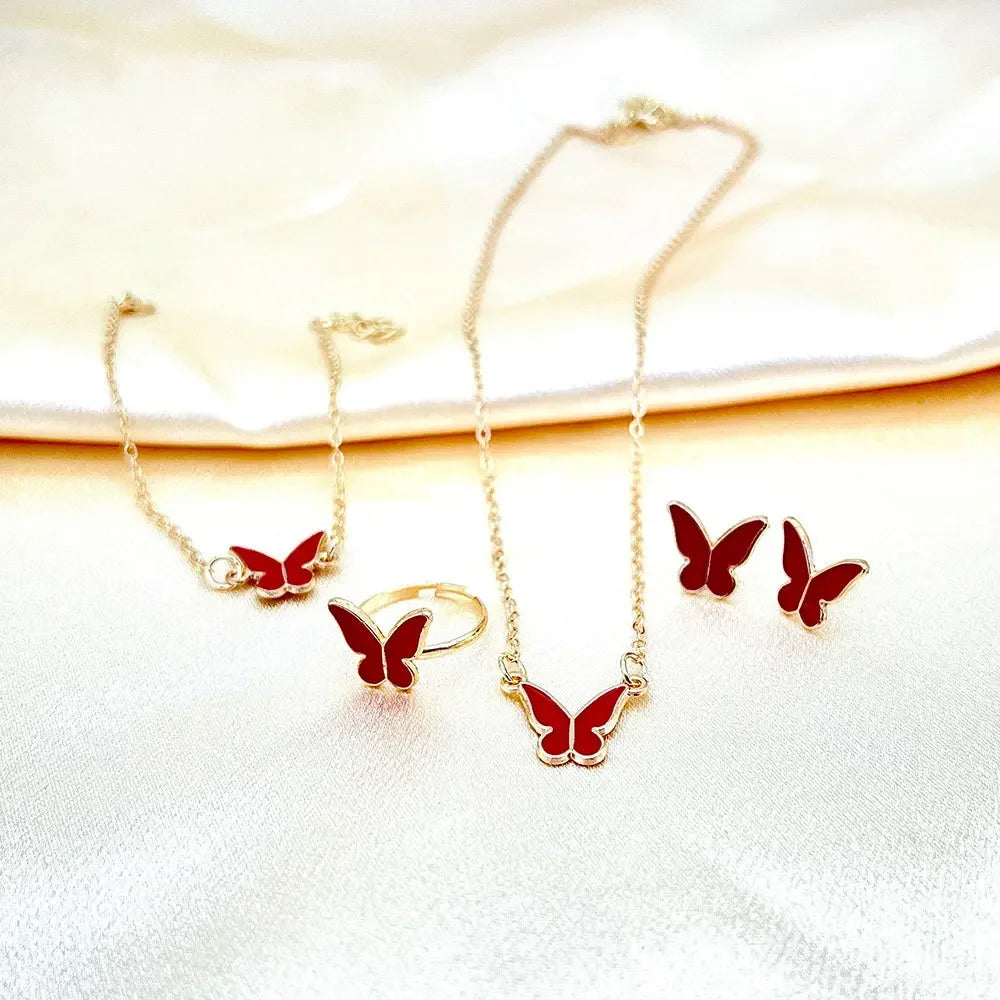 4-delige sieradenset – vlinder hanger en imitatie parel sieraden