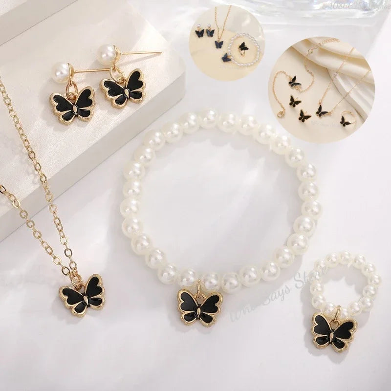 4-delige sieradenset – vlinder hanger en imitatie parel sieraden
