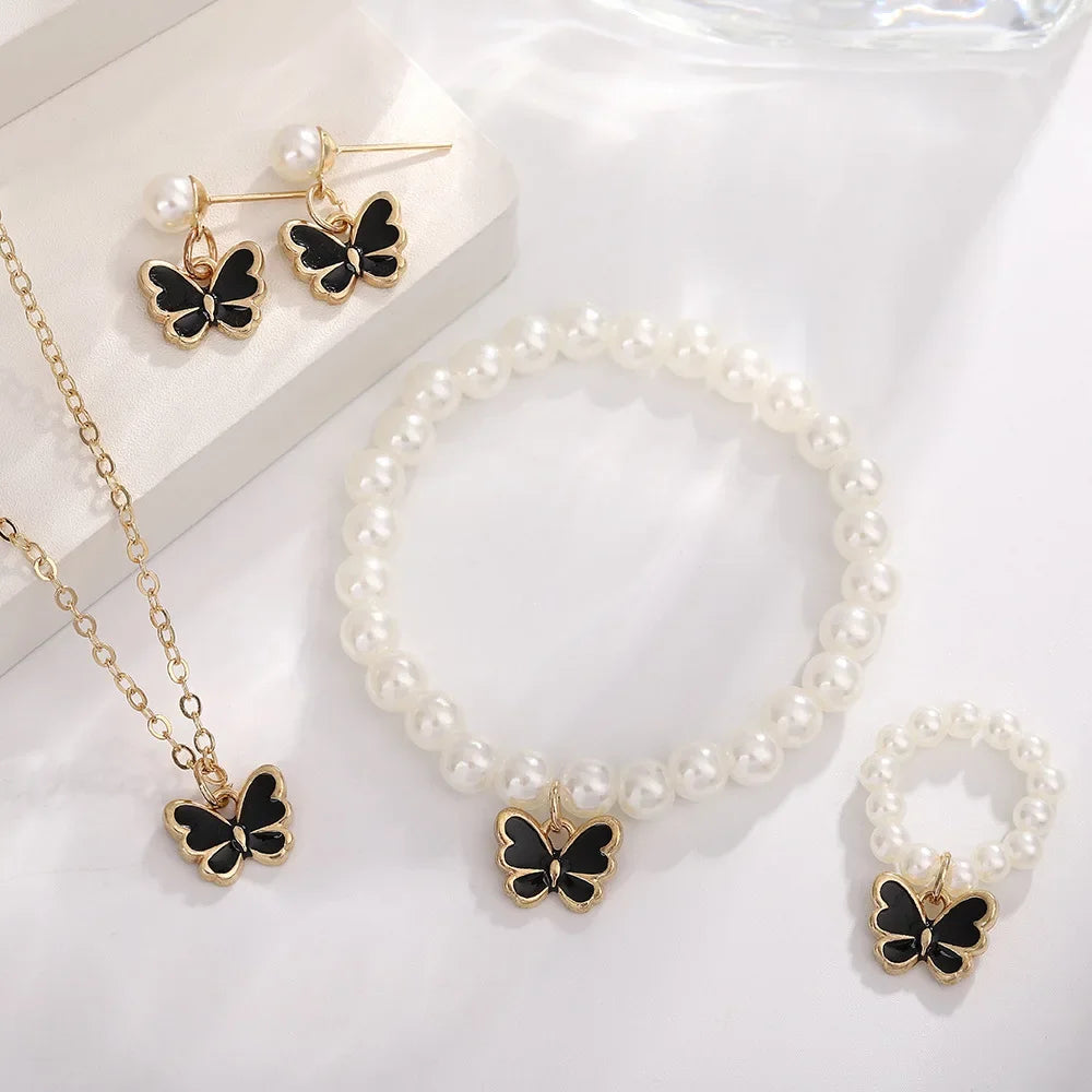 4-delige sieradenset – vlinder hanger en imitatie parel sieraden