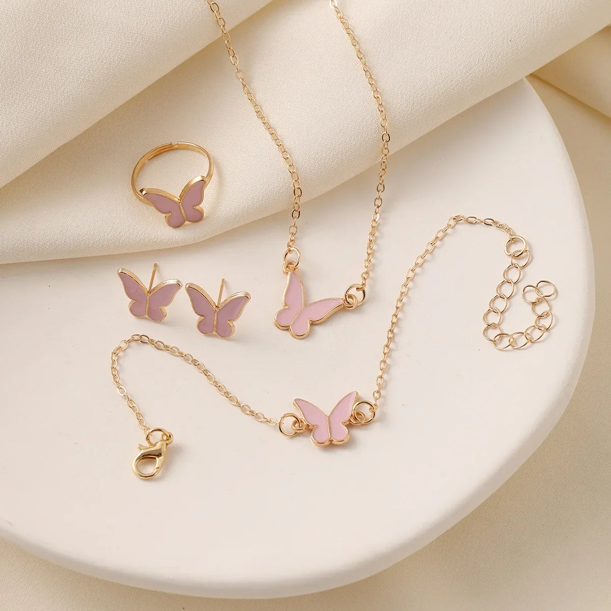 4-delige sieradenset – vlinder hanger en imitatie parel sieraden